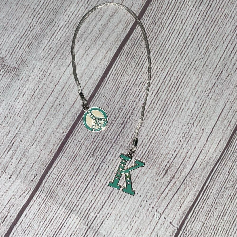 Monogram decorative K charm w/peace sign green & silver colors
